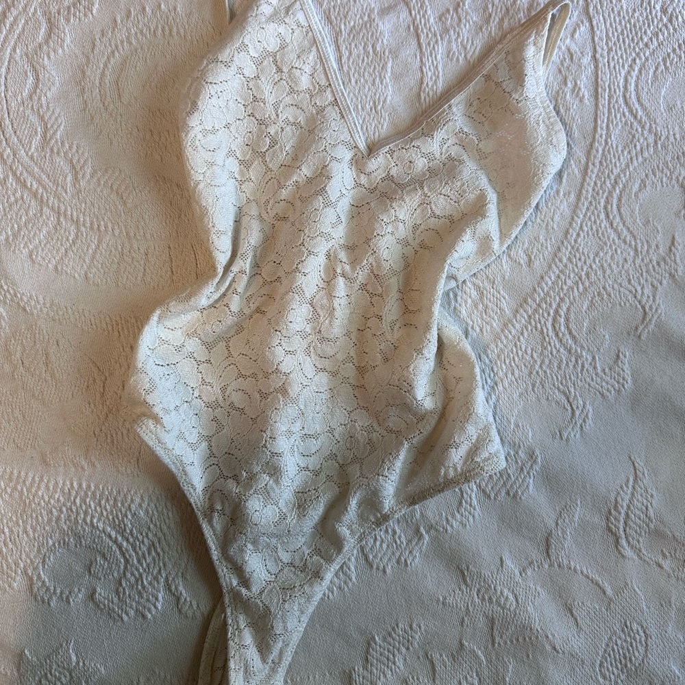 White lace one peice bodysuit